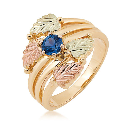 10K yellow gold 1/2 ct. tw. round Yogo sapphire ring with Black Hills Gold detailing