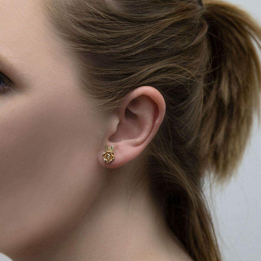 12K pink gold rose and leaf earrings by Mt. Rushmore Black Hills Gold, shown worn