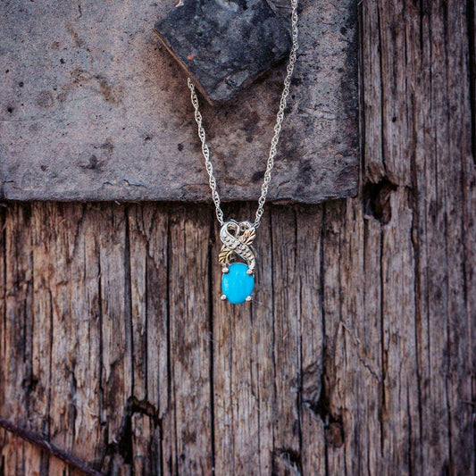 Sterling silver oval turquoise and diamond accent pendant by Mt. Rushmore Black Hills Gold
