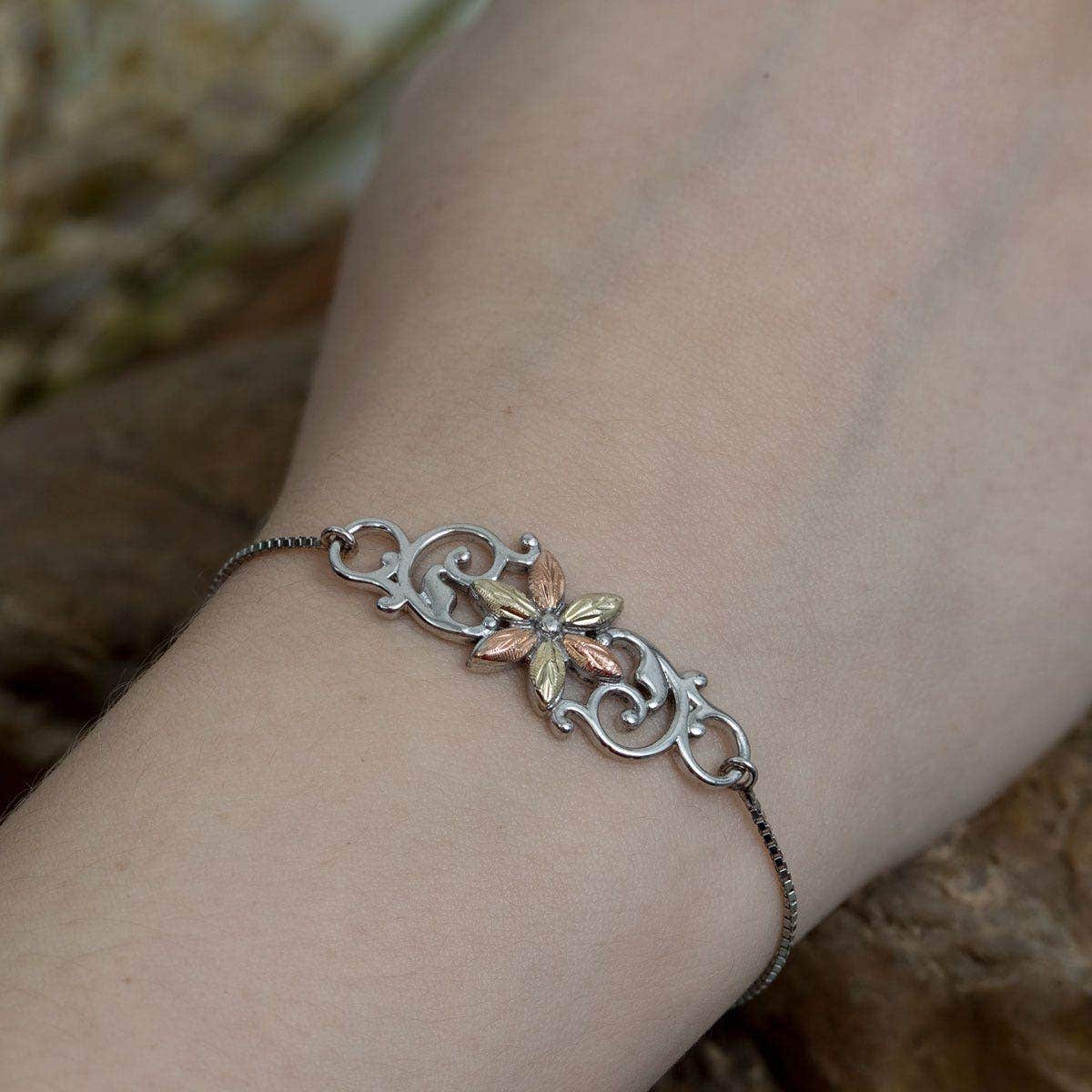 Sterling silver leaf flower and vine bolo bracelet by Mt. Rushmore Black Hills Gold