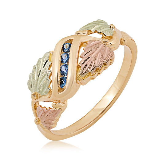 10K yellow gold round Yogo sapphire channel set grapevine and leaf ring with Black Hills Gold detailing