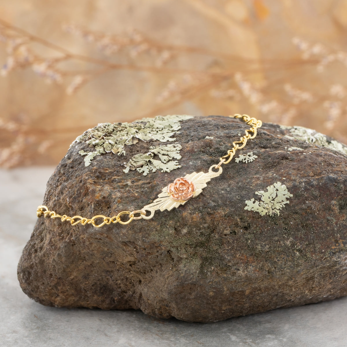 10K yellow gold rose bracelet by Mt. Rushmore Black Hills Gold, styled view