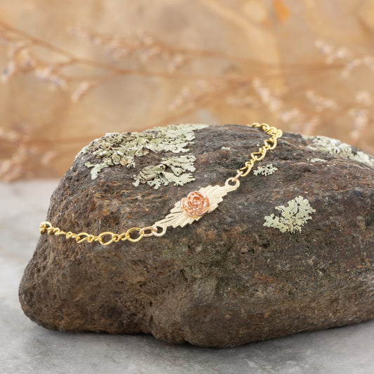 10K yellow gold rose bracelet by Mt. Rushmore Black Hills Gold, styled view