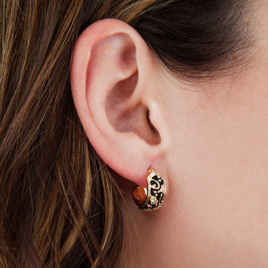 10K yellow gold grapevine antiqued hoop earrings by Landstrom's Black Hills Gold, shown worn