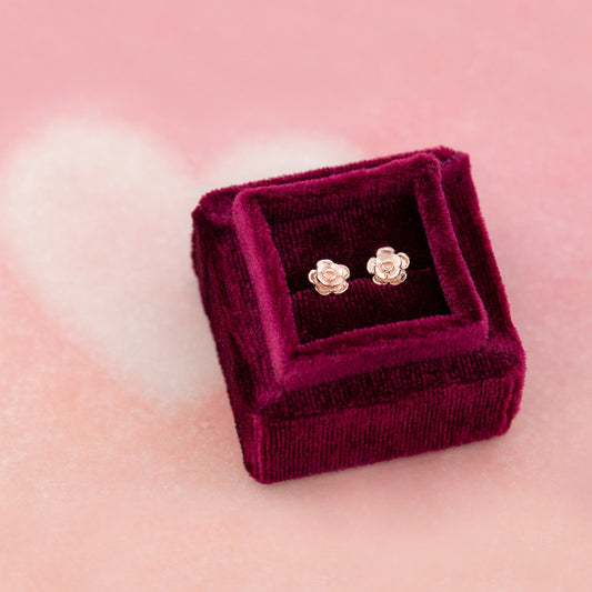 10K pink gold 6mm rose stud earrings by Landstrom's Black Hills Gold, styled view