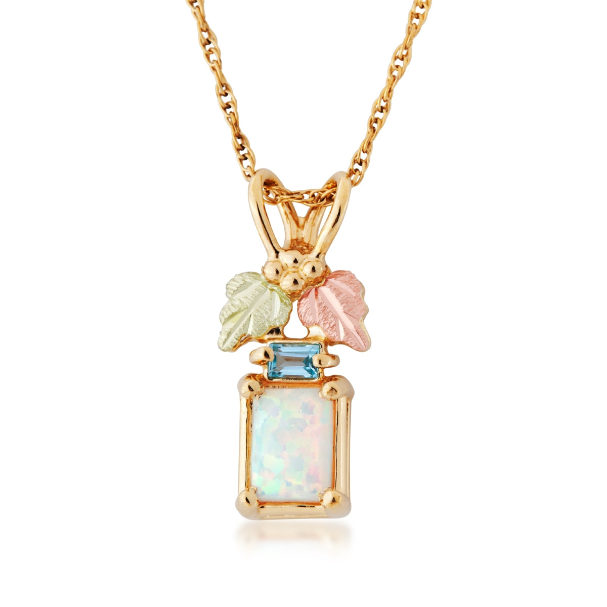 10K yellow gold created rectangle opal and genuine blue topaz pendant by Landstrom's Black Hills Gold