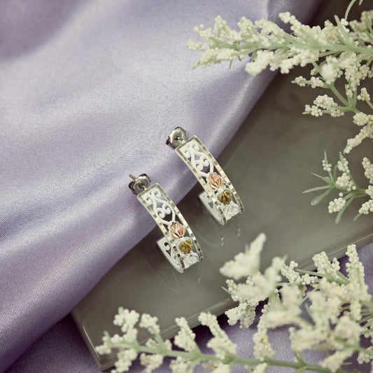 White powder coated j hoop earrings by Mt. Rushmore Black Hills Gold, styled view