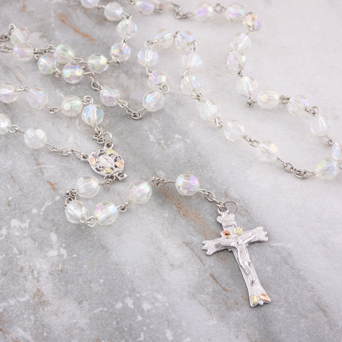 Sterling silver crystal rosary by Landstrom's Black Hills Gold, styled view