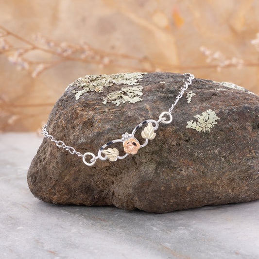 Sterling silver 9" rose bracelet by Landstrom's Black Hills Gold, styled view