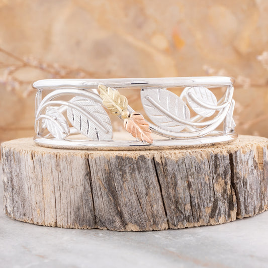 Sterling silver leaf cuff bracelet by Landstrom's Black Hills Gold, styled view
