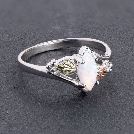 Sterling silver created marquise white opal ring by Landstrom's Black Hills Gold, styled view