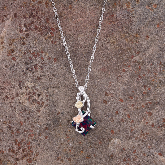 Sterling silver created mosaic opal pendant by Landstrom's Black Hills Gold, styled view