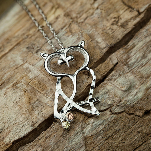 Sterling silver owl pendant by Landstrom's Black Hills Gold, styled view