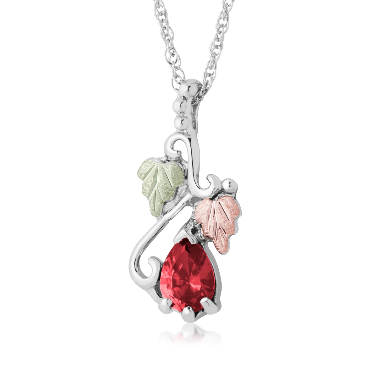 Sterling silver synthetic pear ruby and leaf pendant by Landstrom's Black Hills Gold