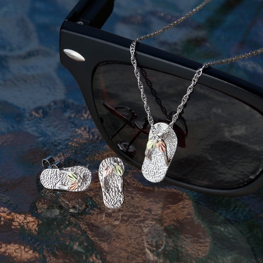 Sterling silver flip flop pendant by Landstrom's Black Hills Gold, styled view