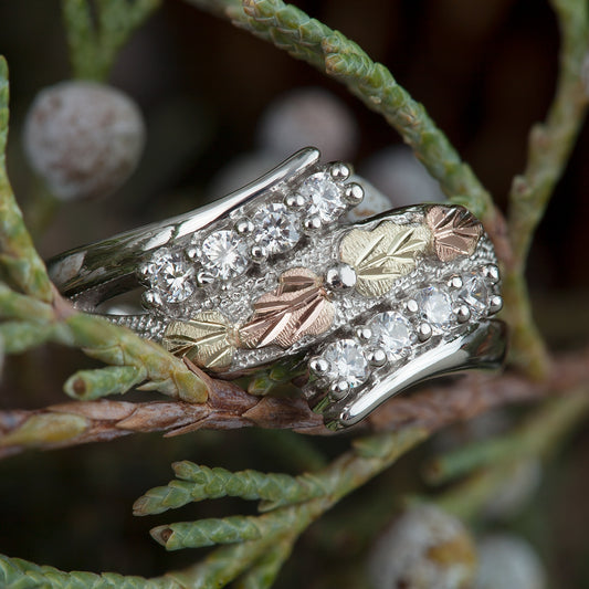 Sterling silver cubic zirconia and leaf wrap ring by Landstrom's Black Hills Gold, styled view