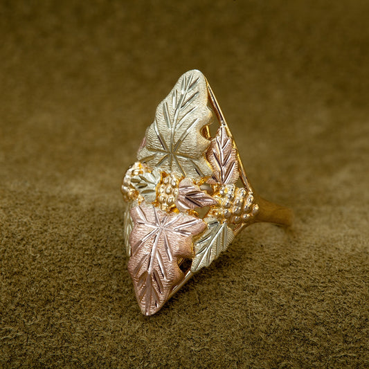 10K yellow gold leaf and grape cluster elongated marquise ring by Landstrom's Black Hills Gold, styled view