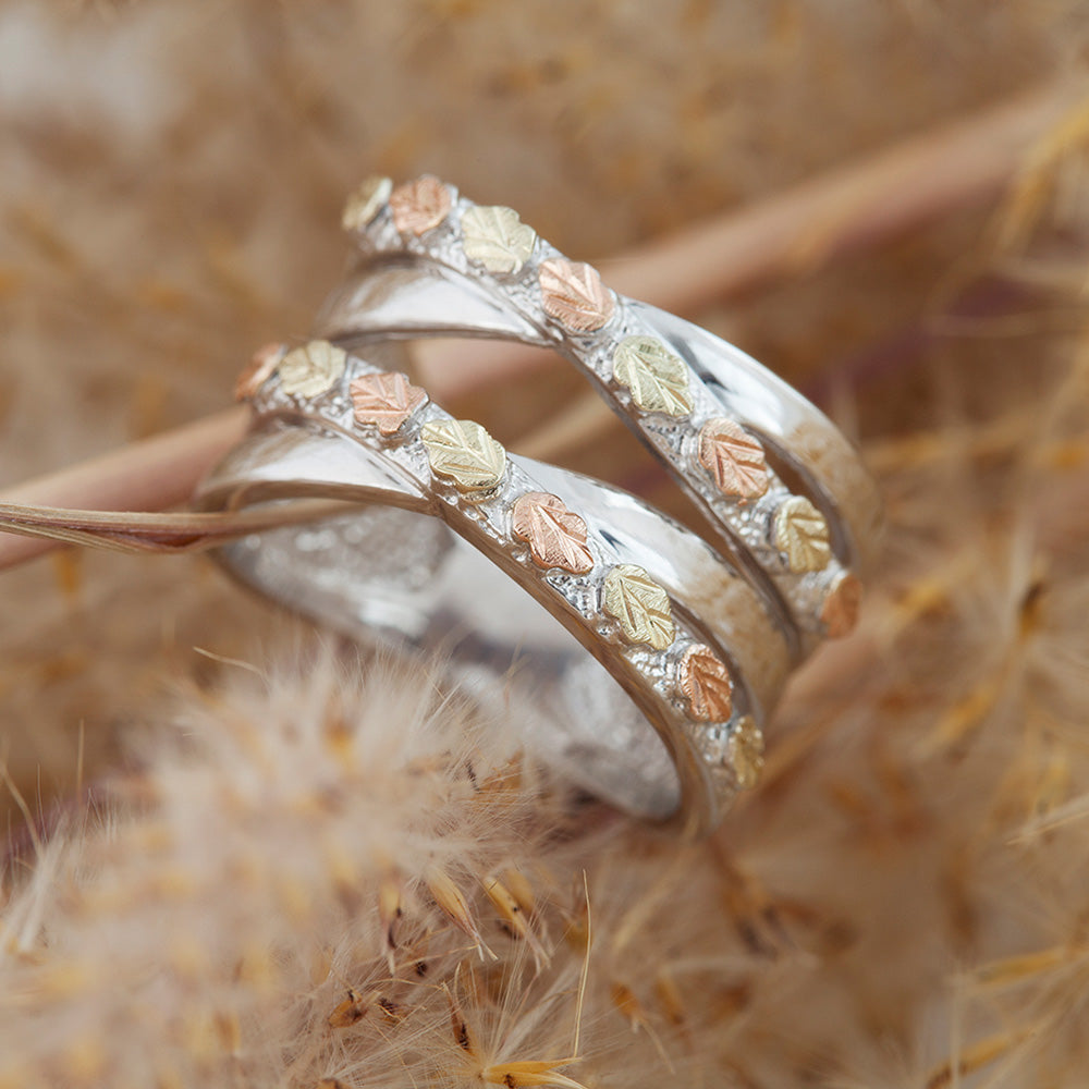 Sterling silver layered crossover ring by Landstrom's Black Hills Gold, styled view