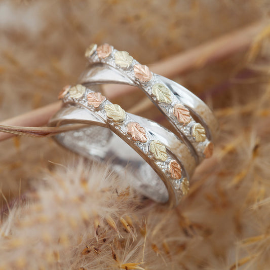 Sterling silver layered crossover ring by Landstrom's Black Hills Gold, styled view