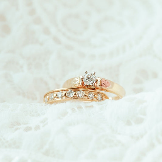 10K yellow gold 1/3 ct. tw. round diamond wedding ring by Landstrom's Black Hills Gold, styled view
