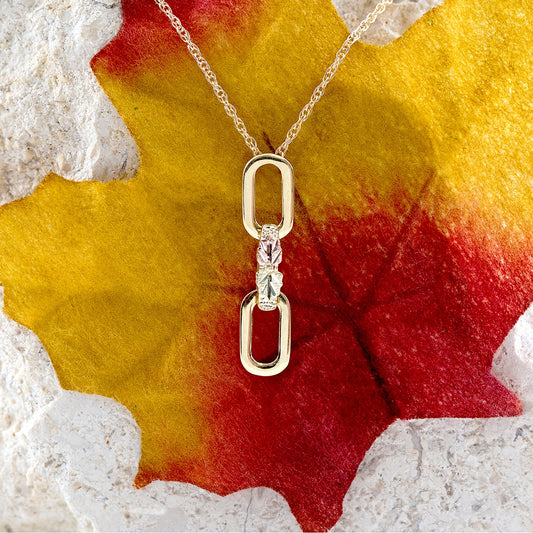 10K yellow gold dangle link pendant by Landstrom's Black Hills Gold, styled view