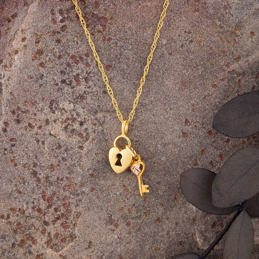 10K yellow gold heart lock and key pendant by Mt. Rushmore Black Hills Gold, styled view