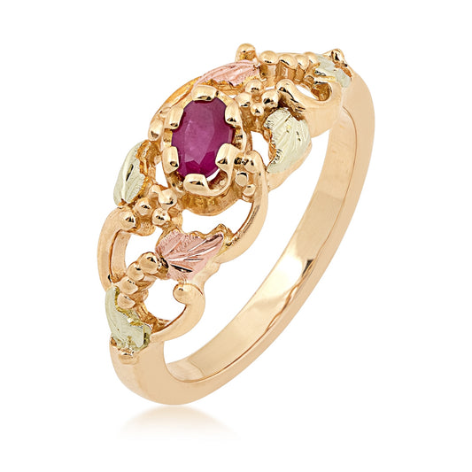 10K yellow gold oval ruby grapevine and leaf open ring by Landstrom's Black Hills Gold