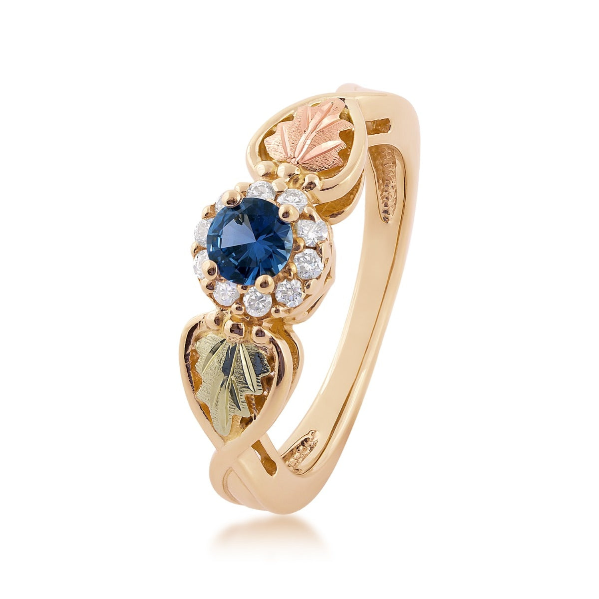 10K yellow gold round Yogo sapphire and 1/6 ct. tw. diamond halo ring with Black Hills Gold detailing
