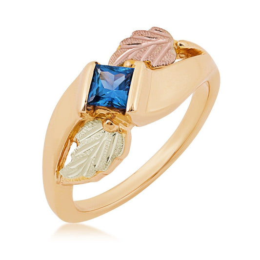 10K yellow gold princess cut Yogo sapphire double leaf ring with Black Hills Gold detailing