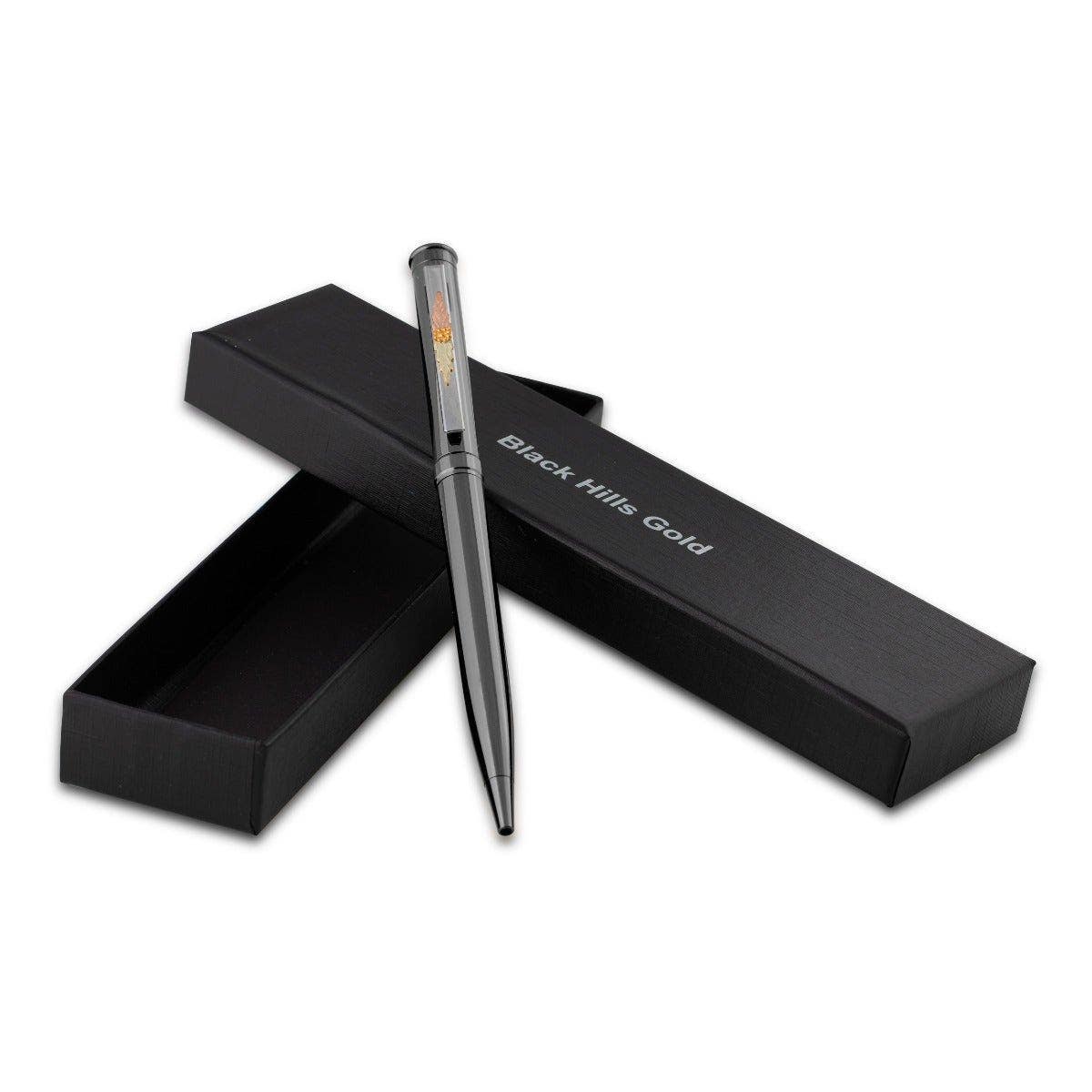 Black pen featuring ink refill and box by Mt. Rushmore Black Hills Gold