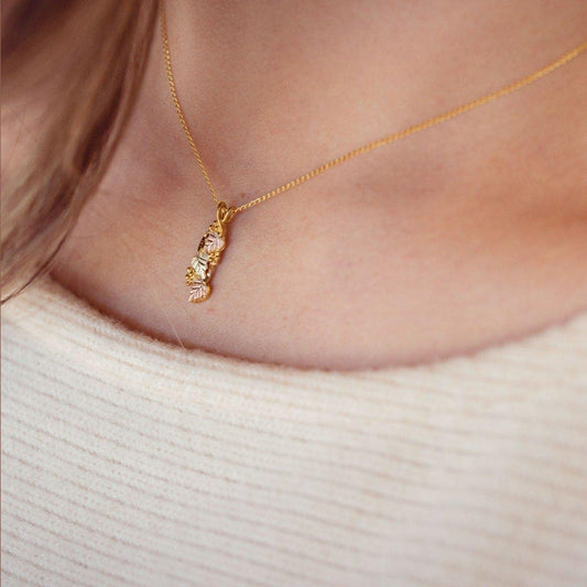 10K yellow gold twisted hanging grapevine pendant by Mt. Rushmore Black Hills Gold