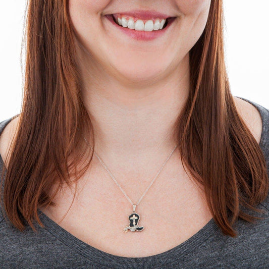Sterling silver antiqued cowboy boot pendant featuring cross by Mt. Rushmore Black Hills Gold