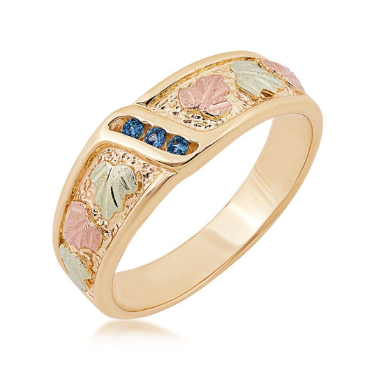 10K yellow gold men's round 3-stone Yogo sapphire channel set wedding ring with Black Hills Gold detailing