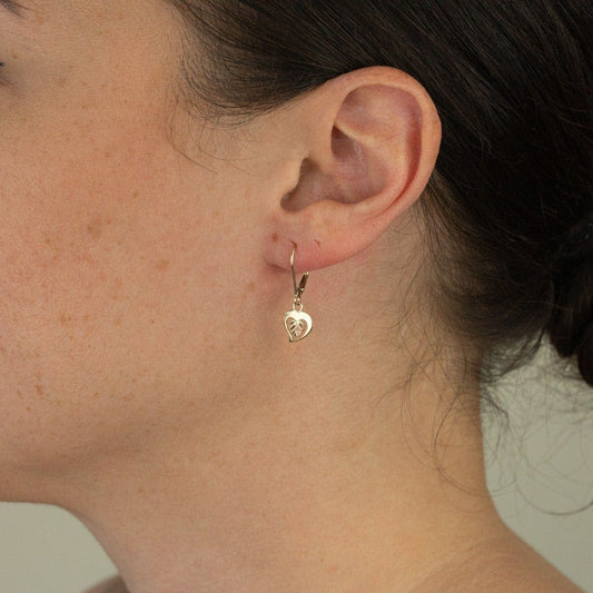 10K yellow gold heart and two-tone leaf dangle earrings by Mt. Rushmore Black Hills Gold