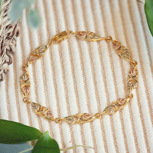 10K yellow gold 8" diamond cut grapevine and leaf link bracelet by Mt. Rushmore Black Hills Gold