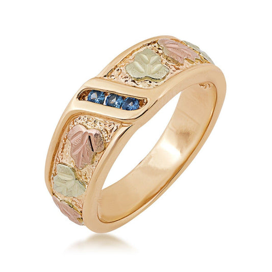 10K yellow gold round 3-stone Yogo sapphire channel set wedding ring with Black Hills Gold detailing
