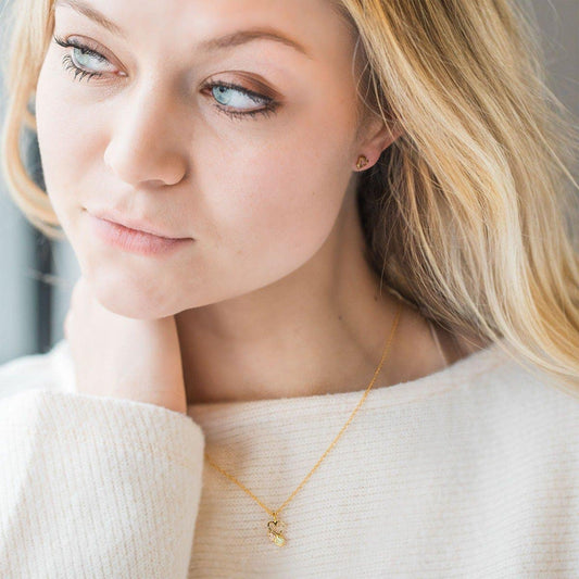 10K yellow gold open heart pendant featuring leaf accents by Mt. Rushmore Black Hills Gold