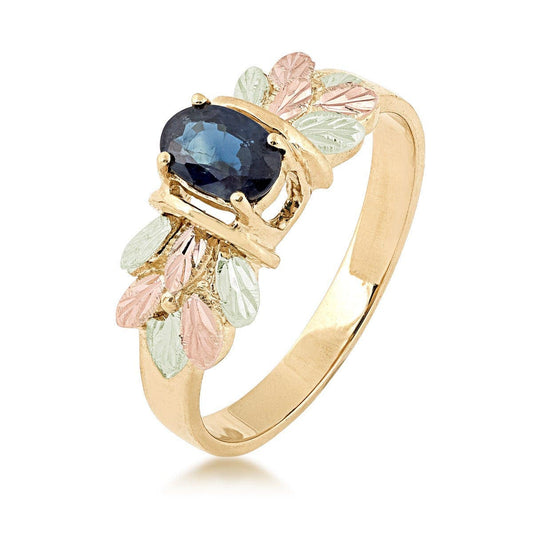 10K yellow gold oval sapphire and leaf cluster ring by Mt. Rushmore Black Hills Gold