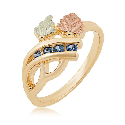 10K yellow gold round Yogo sapphire channel set vine ring with Black Hills Gold detailing