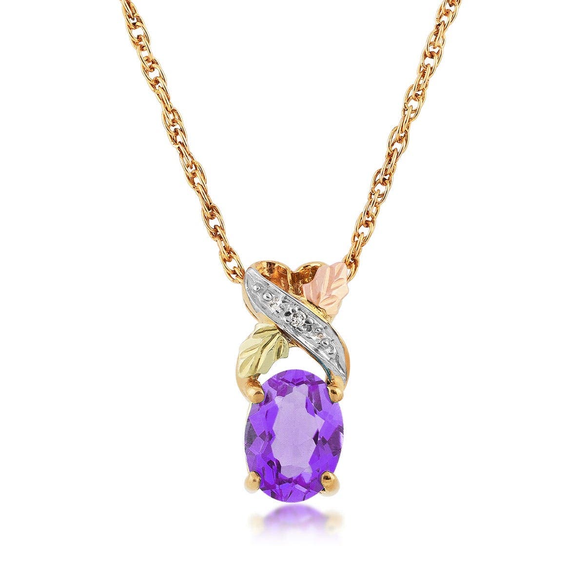 10K yellow gold oval amethyst and diamond accent twist pendant by Mt. Rushmore Black Hills Gold