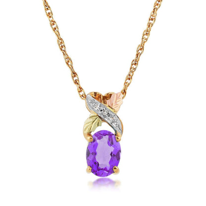 10K yellow gold oval amethyst and diamond accent twist pendant by Mt. Rushmore Black Hills Gold