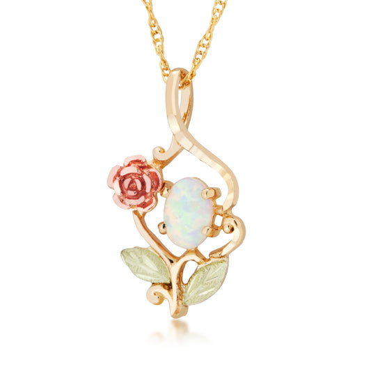 10K yellow gold created oval opal rose stem pendant by Landstrom's Black Hills Gold