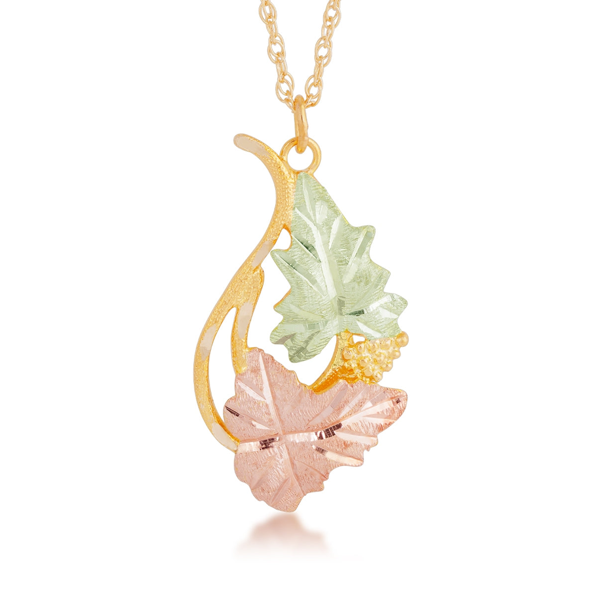 10K yellow gold leaf and grape cluster pendant by Landstrom's Black Hills Gold