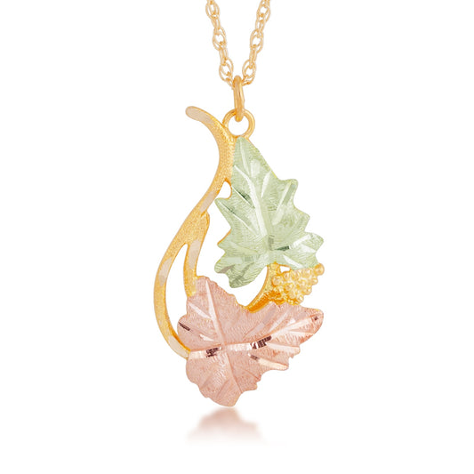 10K yellow gold leaf and grape cluster pendant by Landstrom's Black Hills Gold