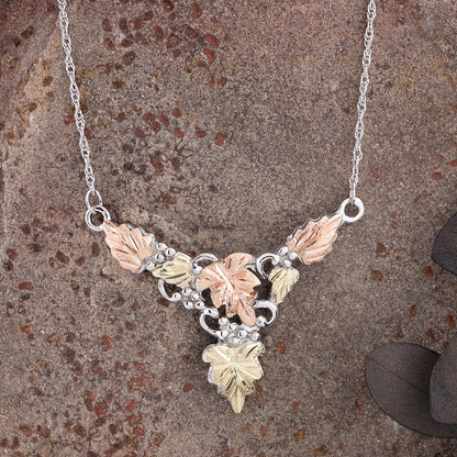 Sterling silver leaf chevron necklace by Landstrom's Black Hills Gold, styled view