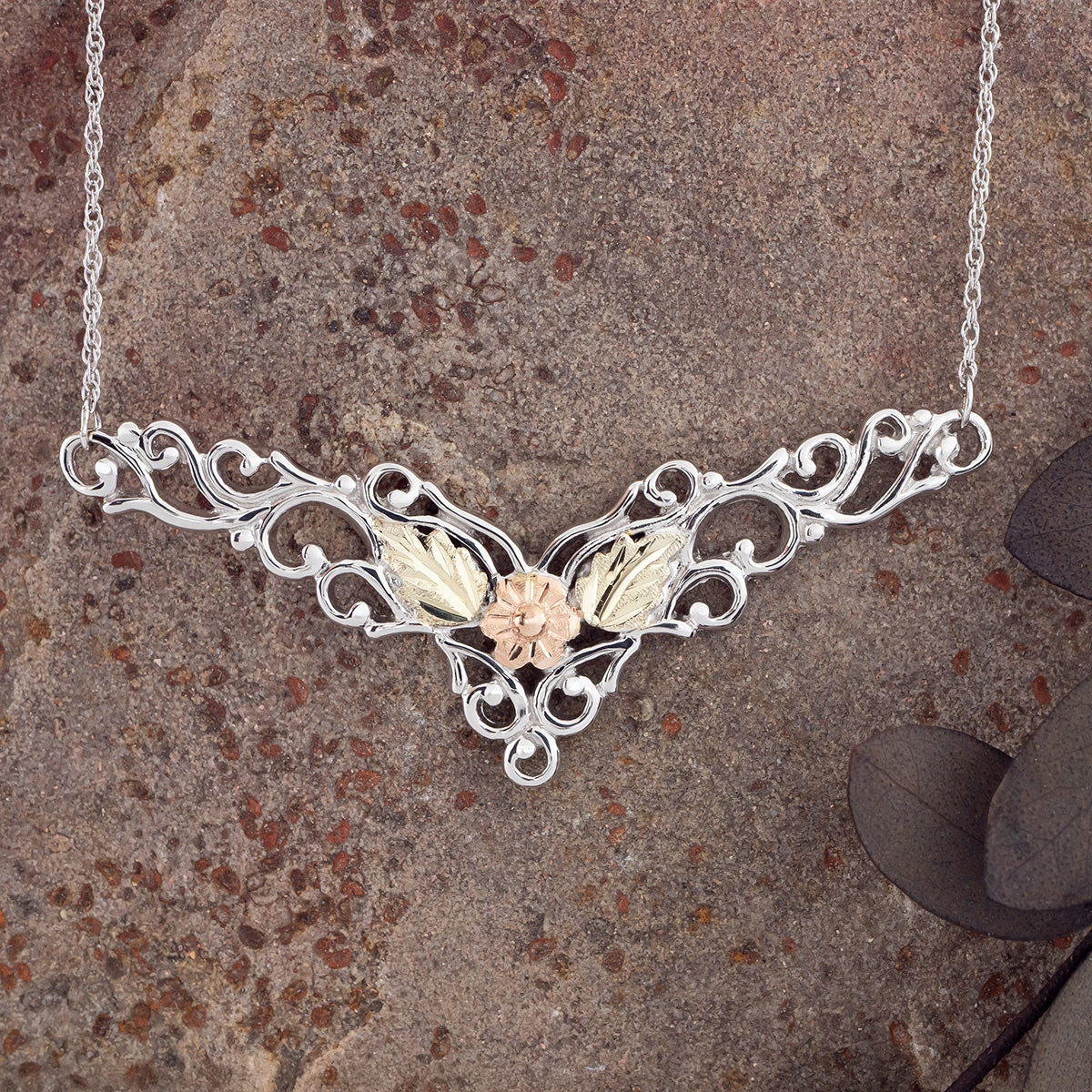 Sterling silver chevron vine necklace by Landstrom's Black Hills Gold, styled view