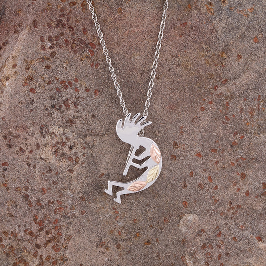 Sterling silver kokopelli pendant by Landstrom's Black Hills Gold, styled view