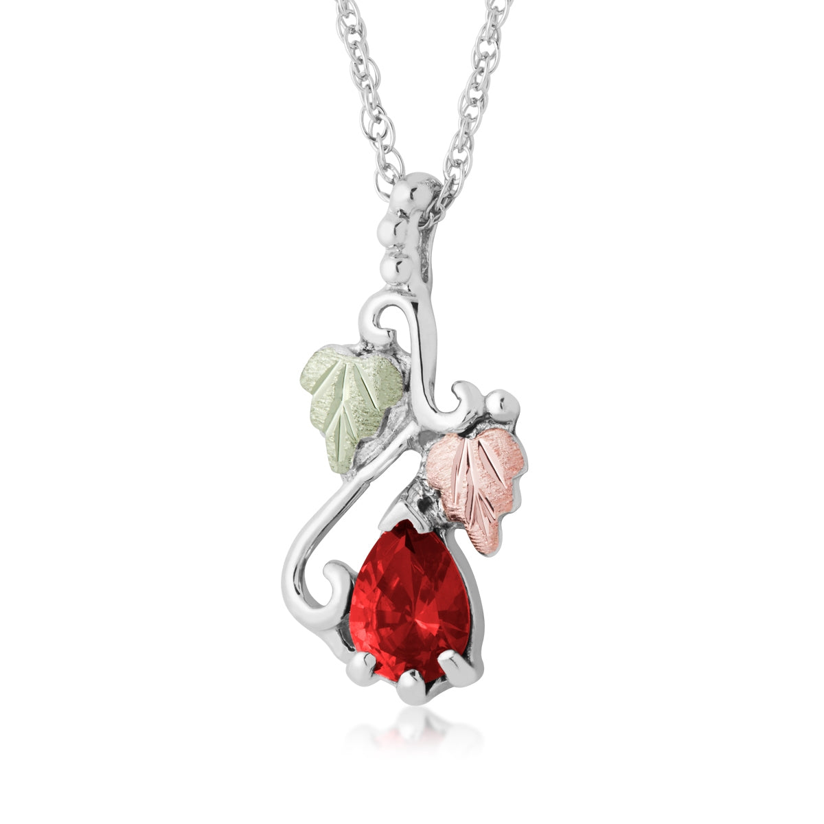Sterling silver synthetic pear garnet vine and leaf pendant by Landstrom's Black Hills Gold