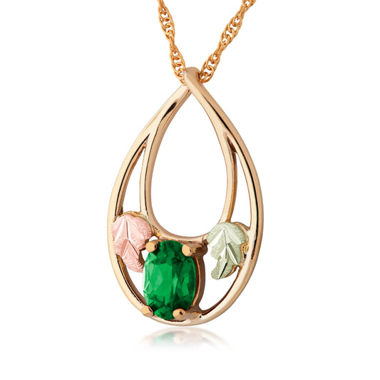 10K yellow gold created oval emerald teardrop pendant by Landstrom's Black Hills Gold