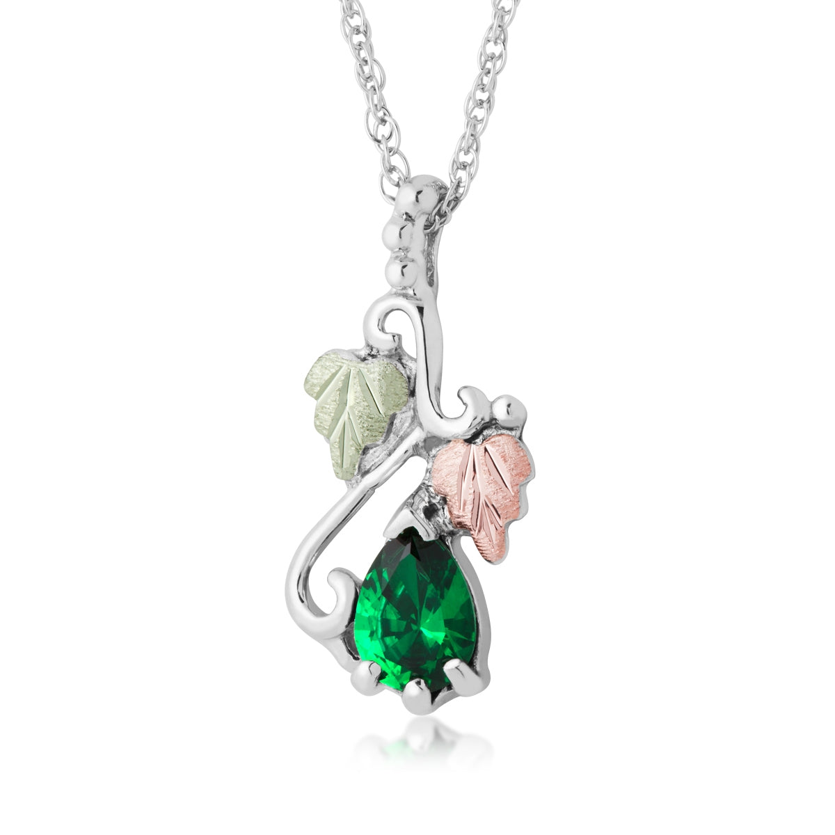 Sterling silver synthetic pear emerald and leaf pendant by Landstrom's Black Hills Gold